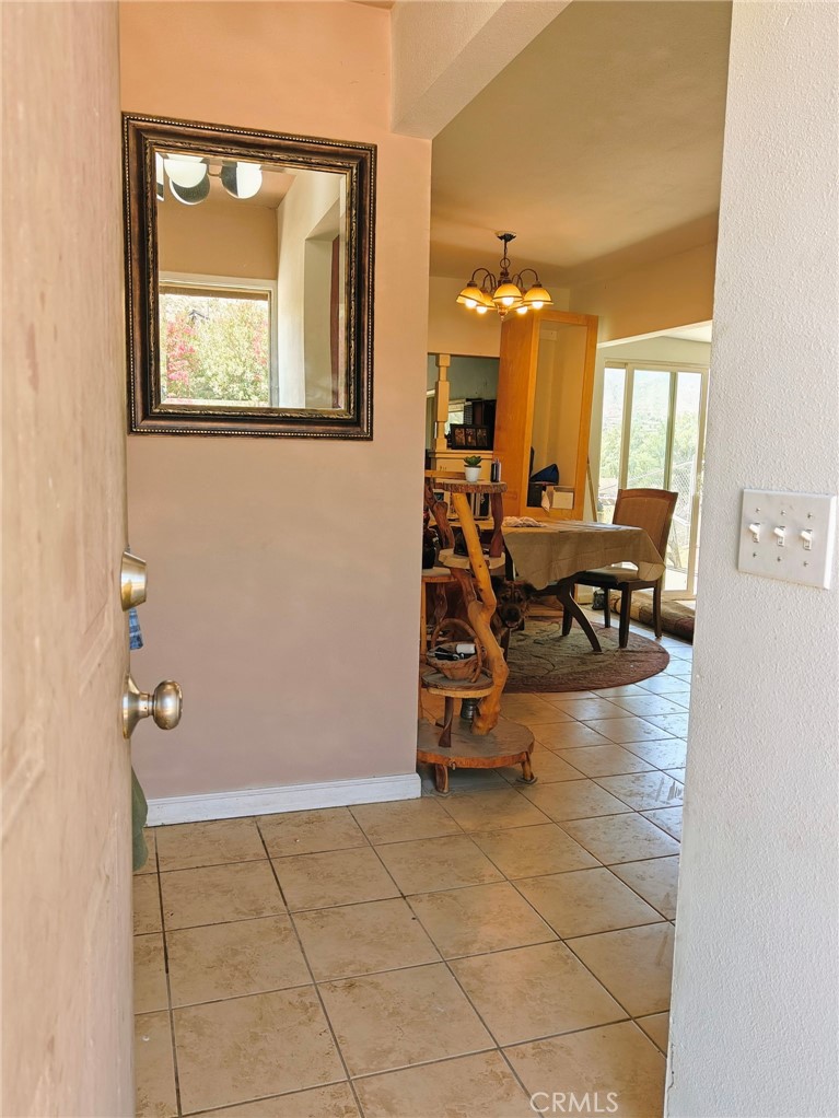 49438 Conejo Road Morongo Valley, CA 92256 - Photo 4 of 18 a view of a livingroom with furniture and a window