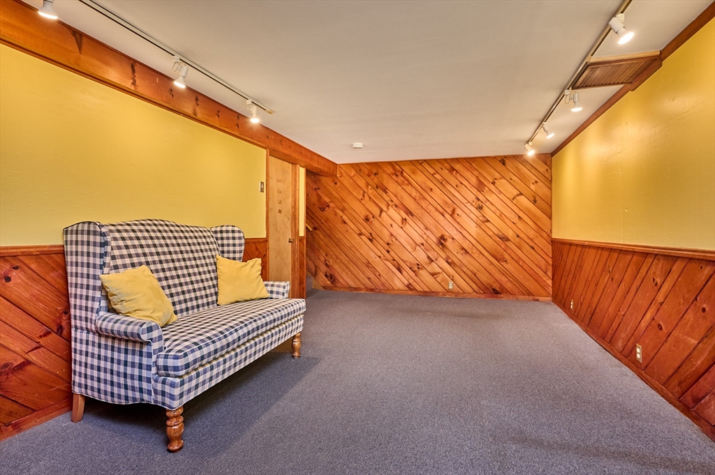 46 Deepwoods Drive Amherst, MA 01002 - Photo 16 of 35 a view of sitting area with furniture and wooden floor