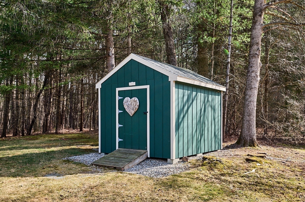 46 Deepwoods Drive Amherst, MA 01002 - Photo 25 of 35 a front view of a house with a yard