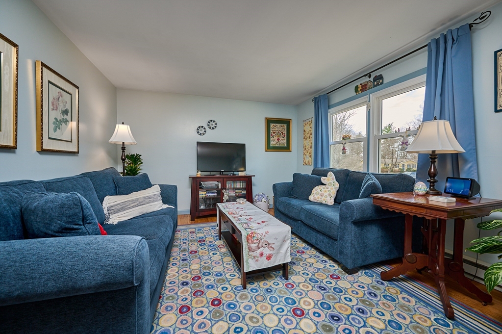 46 Deepwoods Drive Amherst, MA 01002 - Photo 3 of 35 a living room with furniture and a window