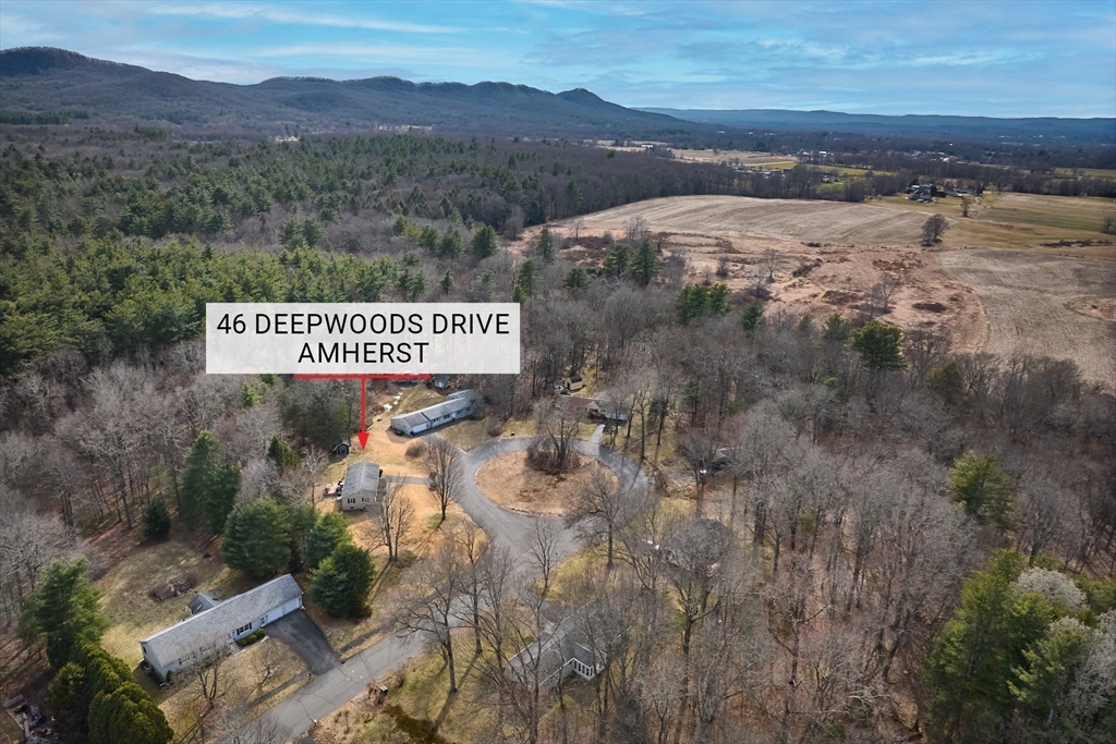 46 Deepwoods Drive Amherst, MA 01002 - Photo 33 of 35 a sign that is sitting on a brick wall