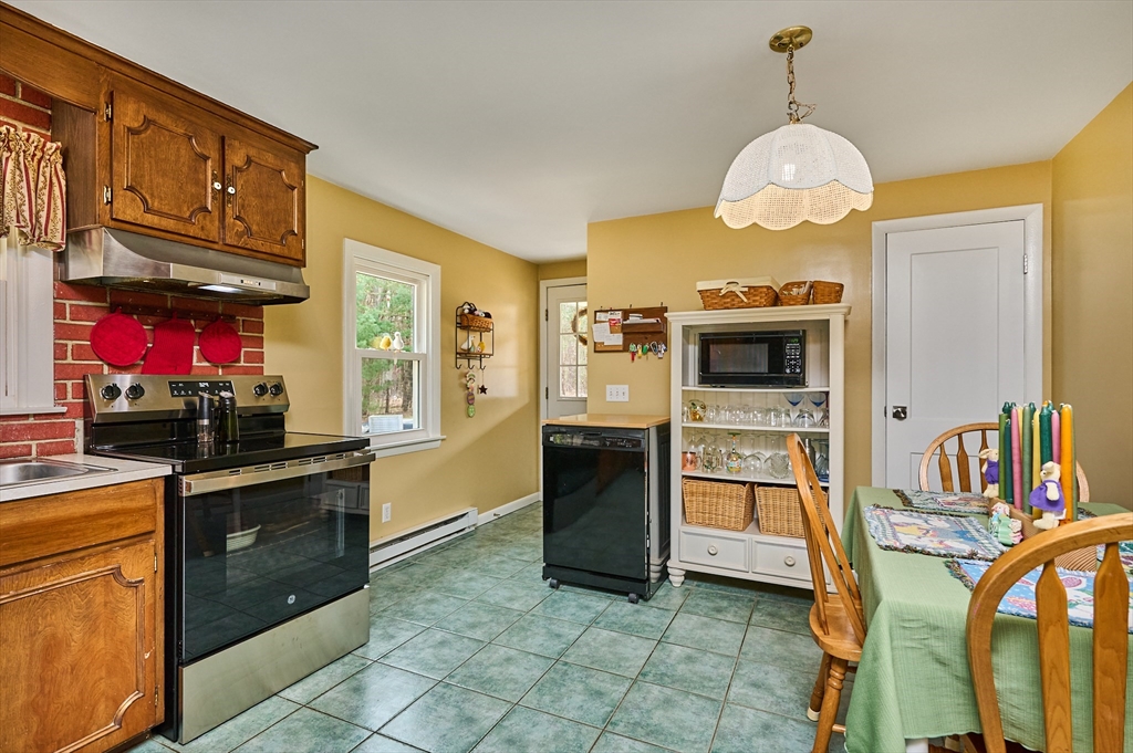46 Deepwoods Drive Amherst, MA 01002 - Photo 5 of 35 a kitchen with stainless steel appliances granite countertop a stove a sink and a refrigerator