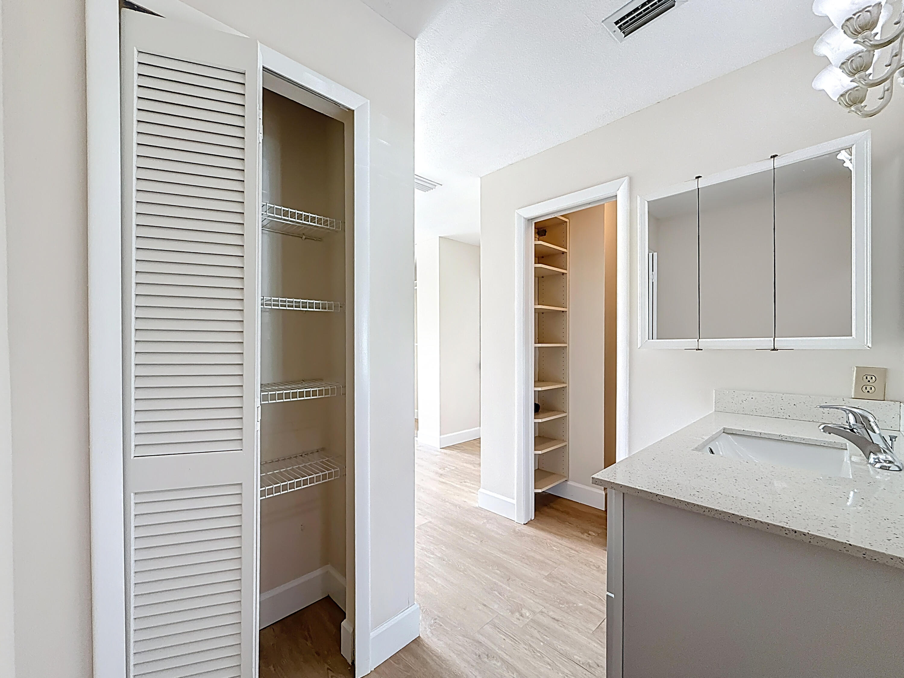 9278 Ketay Circle Boca Raton, FL 33428 - Photo 25 of 55 a view of a kitchen with wooden floor and a sink