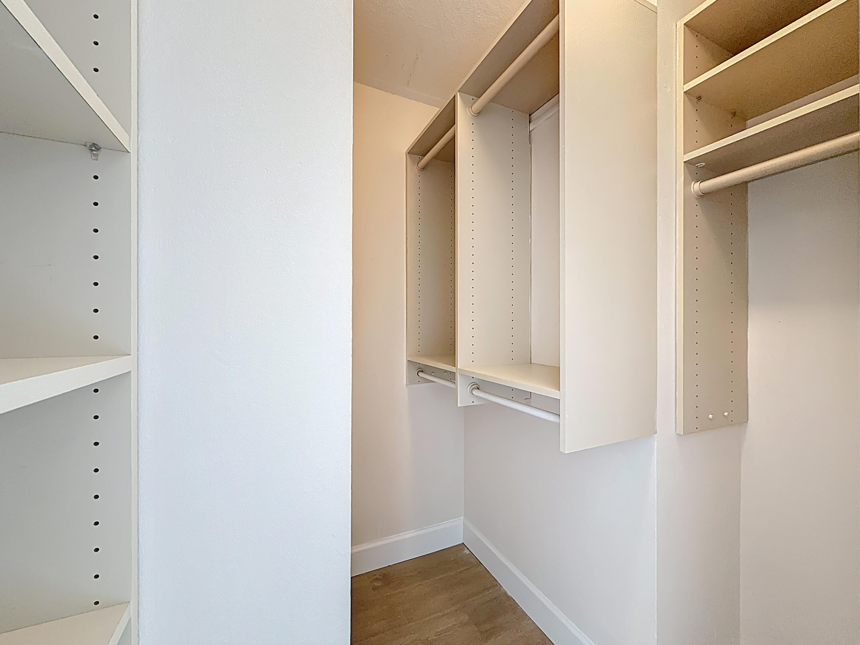 9278 Ketay Circle Boca Raton, FL 33428 - Photo 27 of 55 a view of walk in closet with empty racks