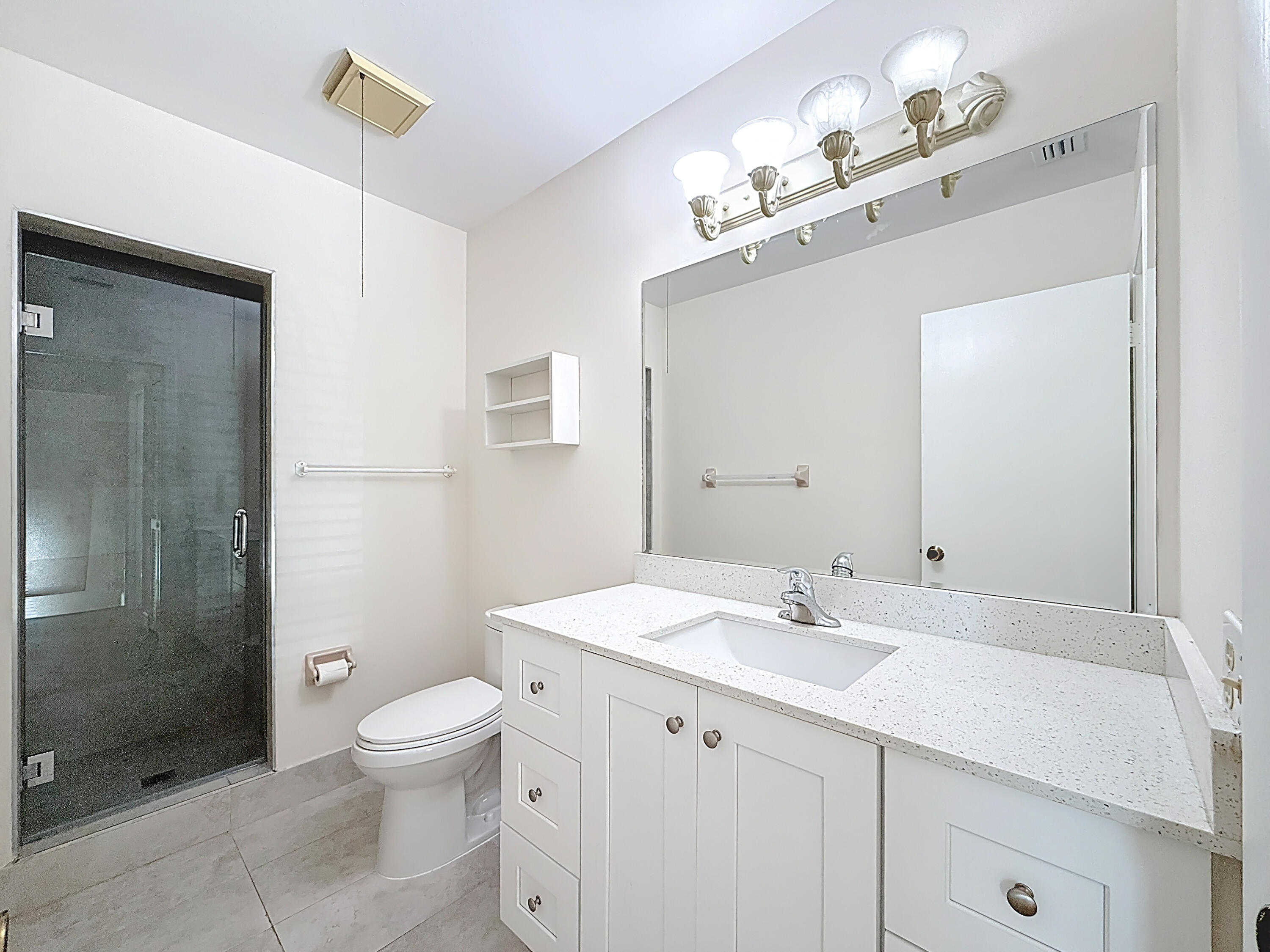 9278 Ketay Circle Boca Raton, FL 33428 - Photo 33 of 55 a bathroom with a sink a toilet and shower