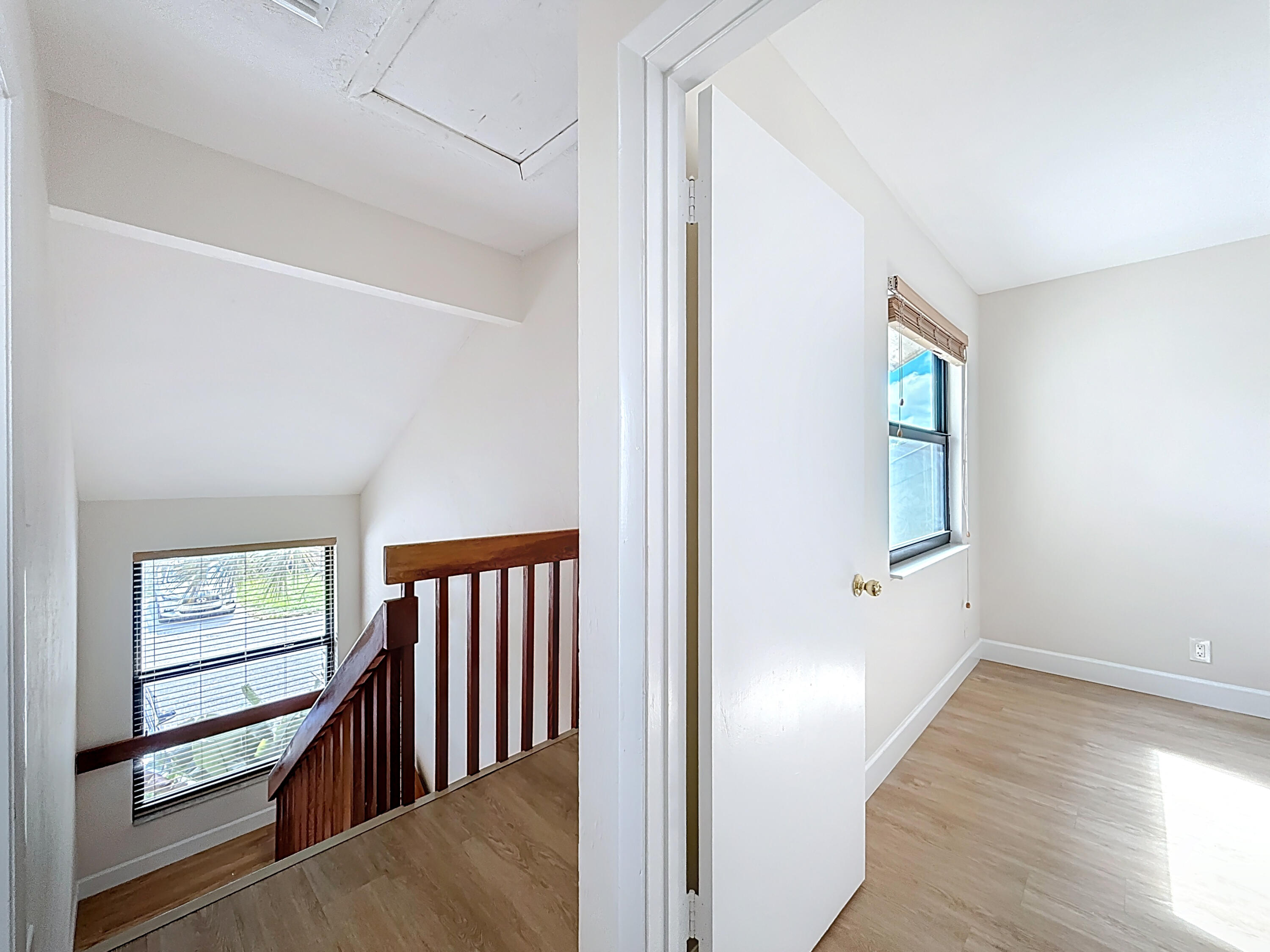 9278 Ketay Circle Boca Raton, FL 33428 - Photo 34 of 55 a view of a hallway with entryway wooden floor and windows
