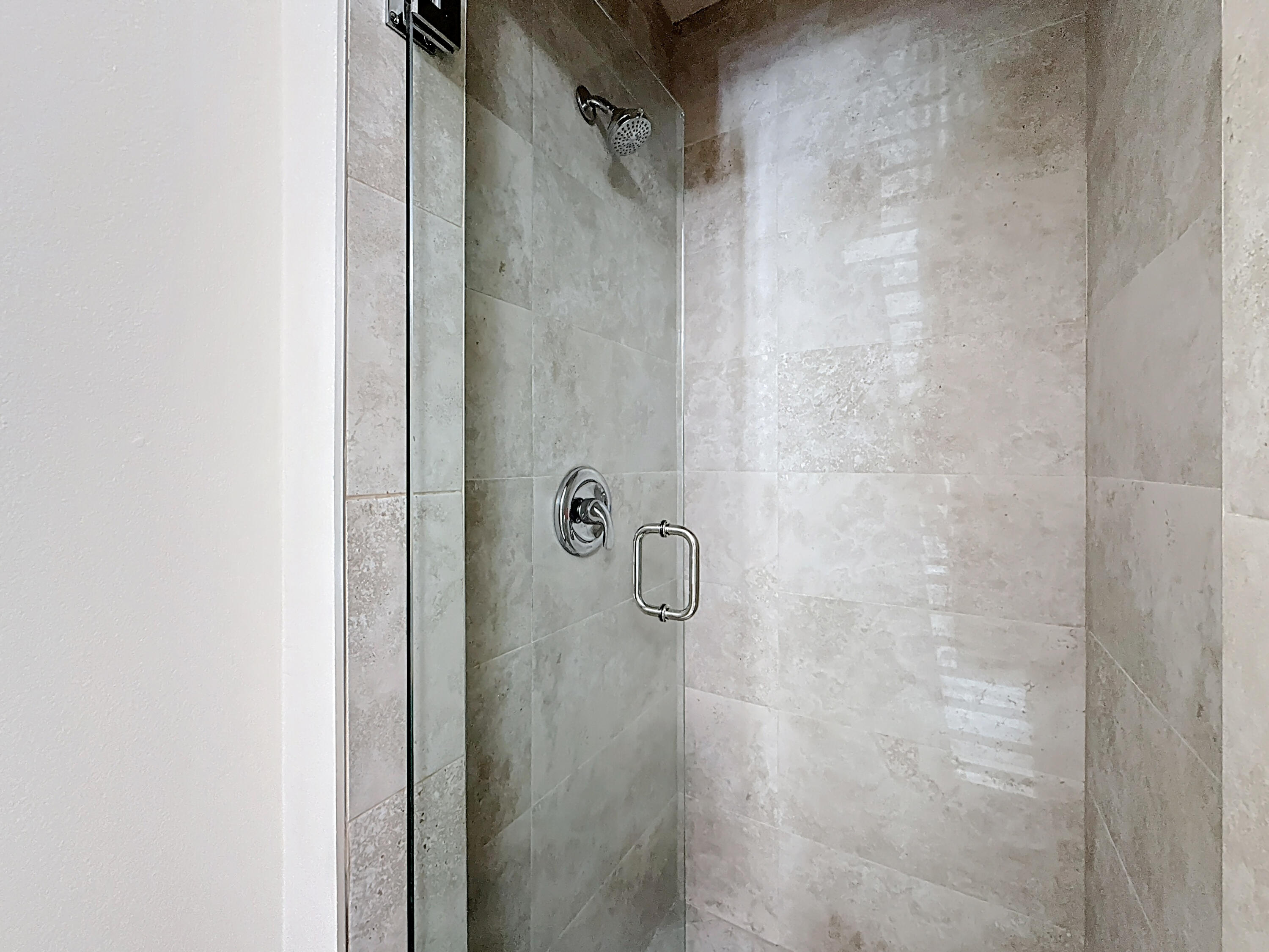 9278 Ketay Circle Boca Raton, FL 33428 - Photo 35 of 55 a bathroom with a glass shower door