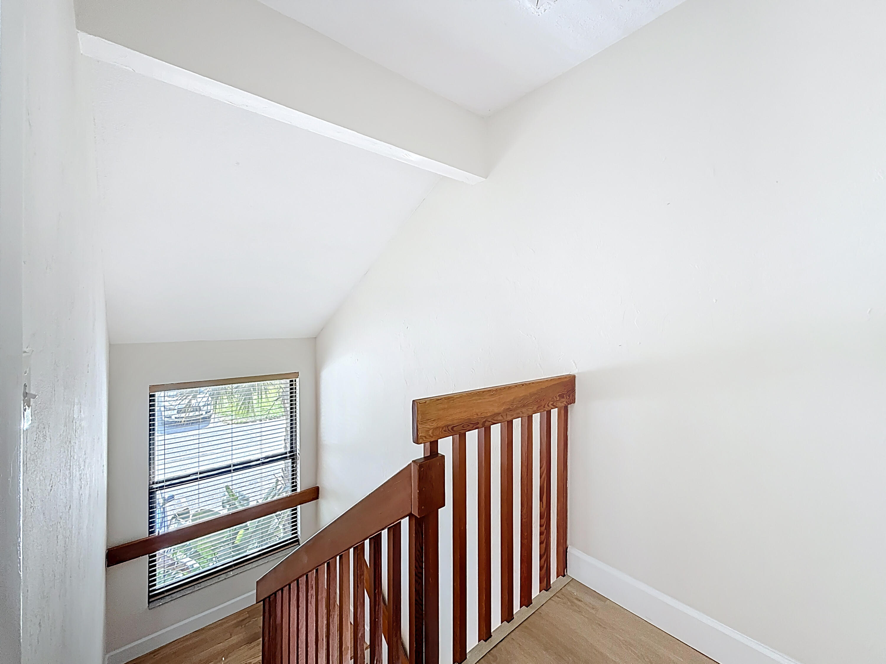 9278 Ketay Circle Boca Raton, FL 33428 - Photo 40 of 55 a view of a hallway with staircase