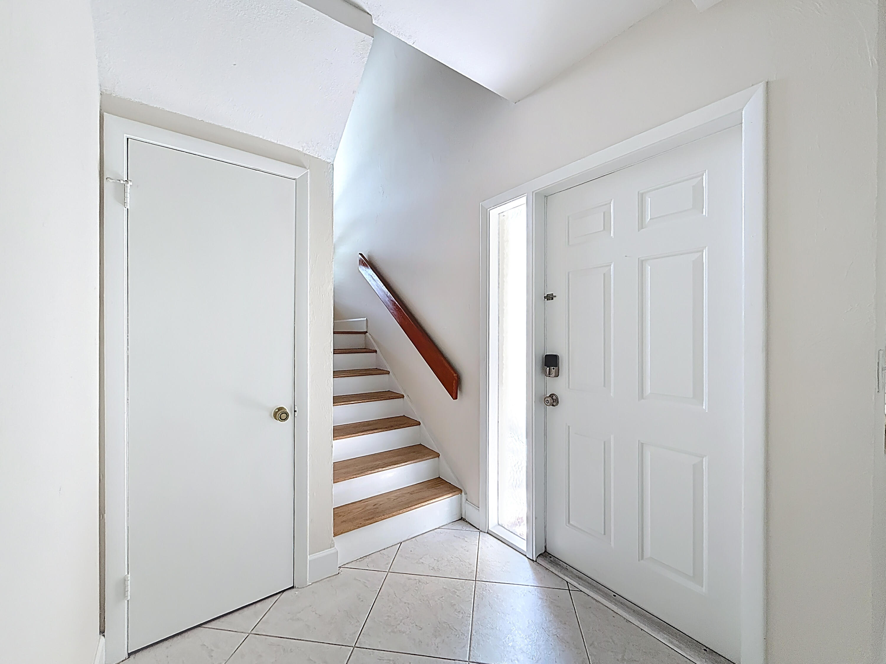 9278 Ketay Circle Boca Raton, FL 33428 - Photo 41 of 55 a view of a hallway with entryway