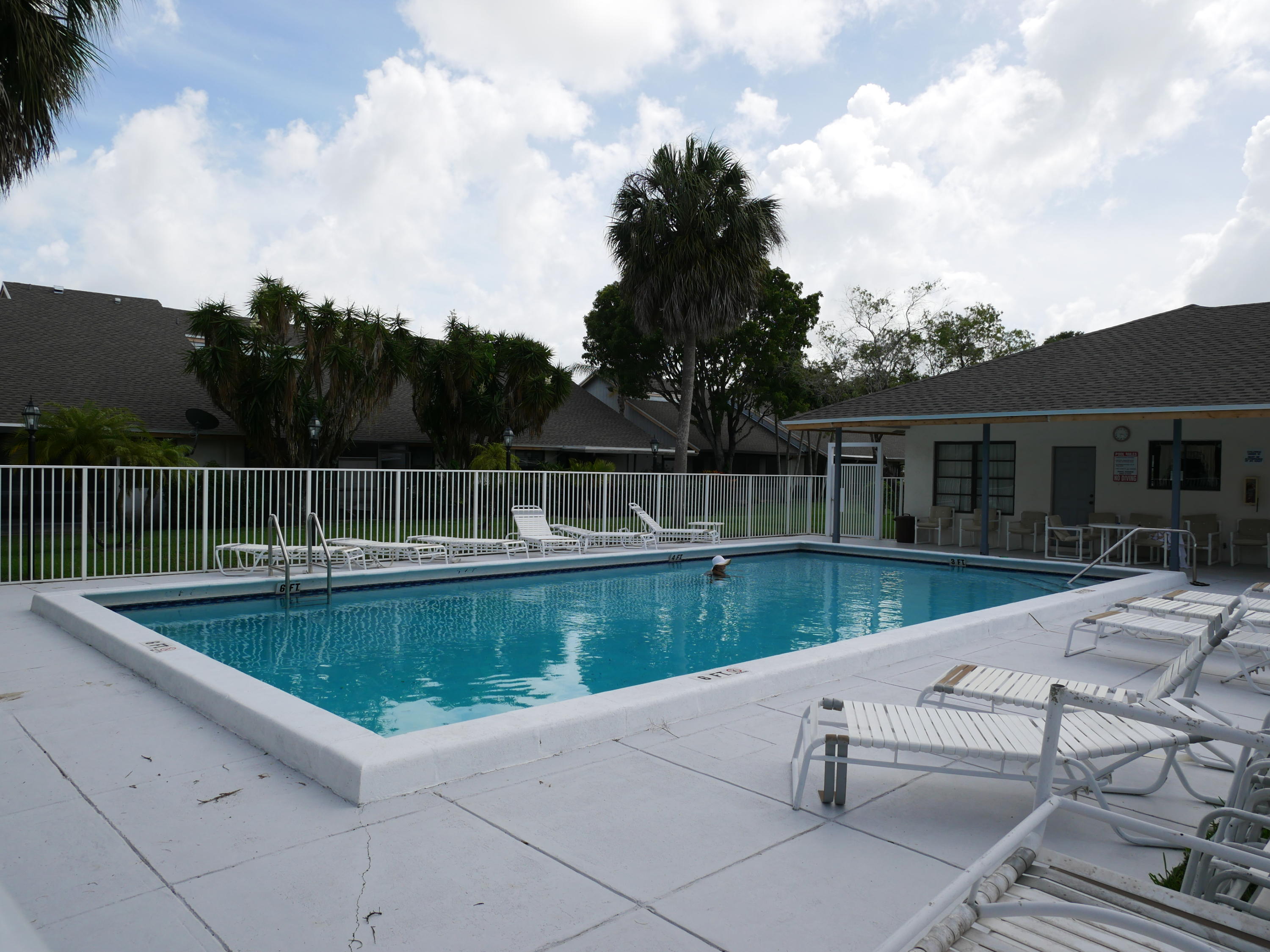 9278 Ketay Circle Boca Raton, FL 33428 - Photo 43 of 55 a view of a patio with a table and chairs