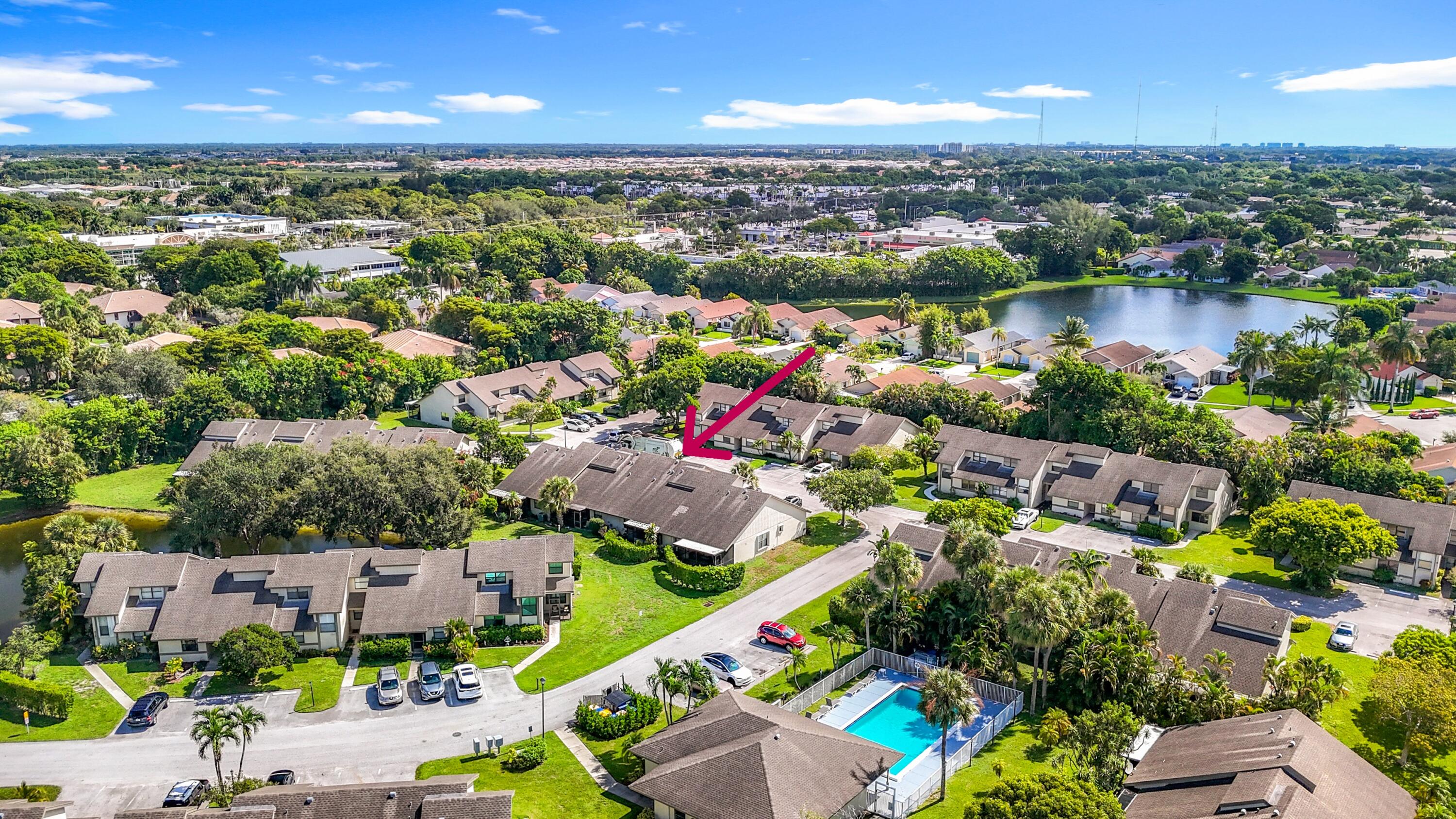 9278 Ketay Circle Boca Raton, FL 33428 - Photo 49 of 55 an aerial view of a city with lots of residential buildings ocean and mountain view in back