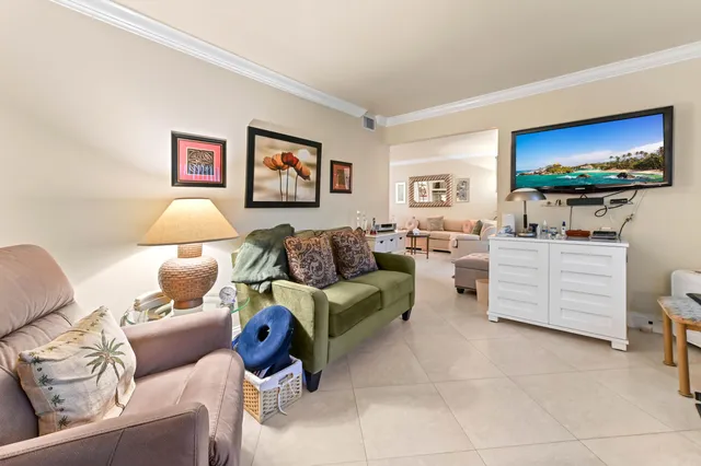 a bathroom with a bed and a view of bathroom