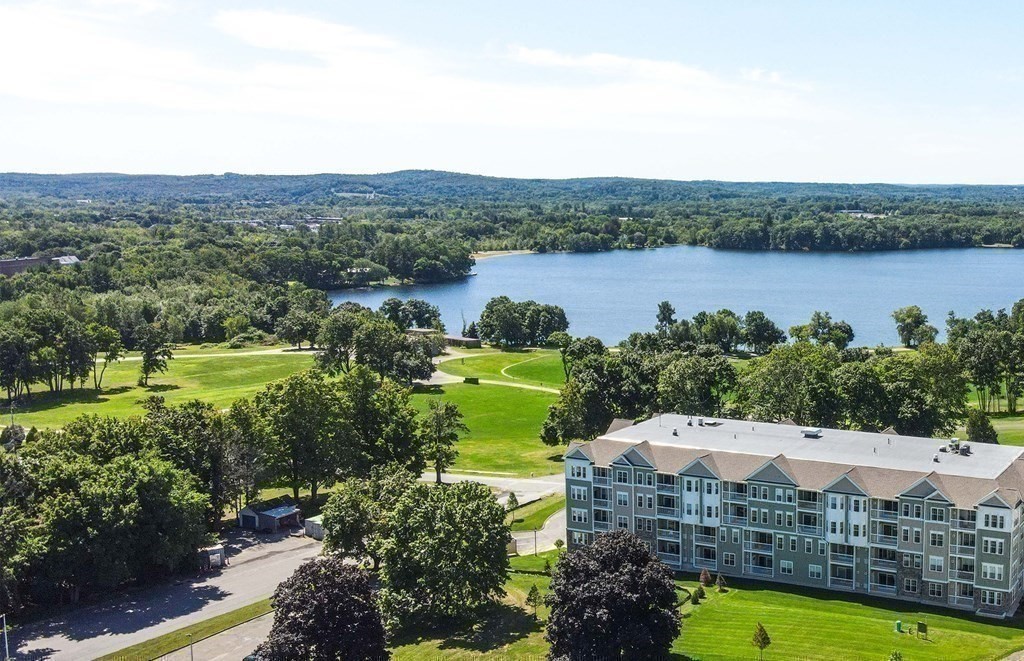 2 Codman Way, Unit 204 Westborough, MA 01581 - Photo 33 of 34 a view of a swimming pool with a lake view