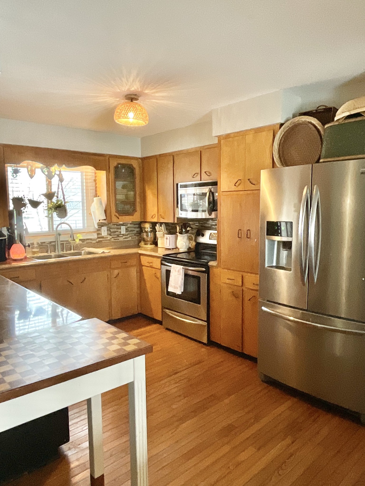 1503 Frances Street Lawrenceburg, TN 38464 - Photo 19 of 44 a large kitchen with stainless steel appliances granite countertop a refrigerator and a stove top oven