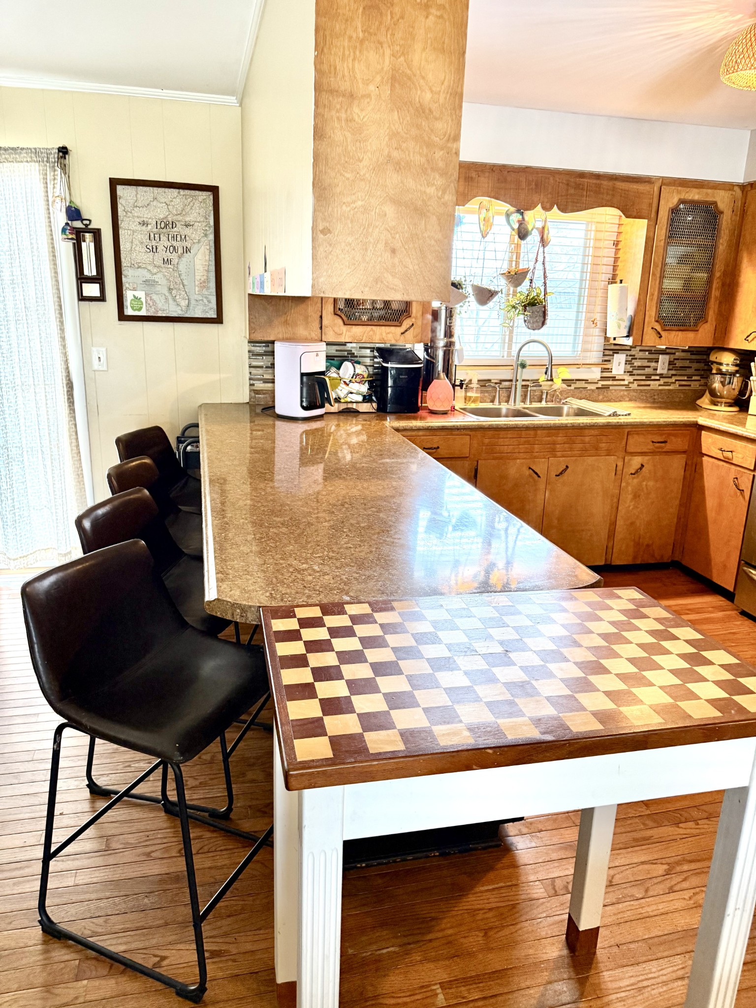 1503 Frances Street Lawrenceburg, TN 38464 - Photo 24 of 44 a living room with couches and a dining table with wooden floor