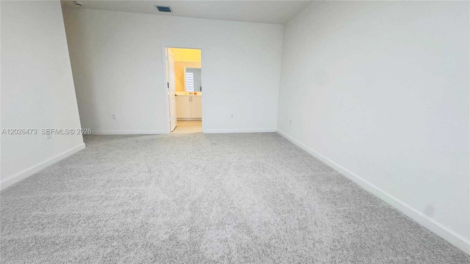 19479 Southwest 340th Street, Unit 1 Homestead, FL 33034 - Photo 17 of 58 a view of an empty room