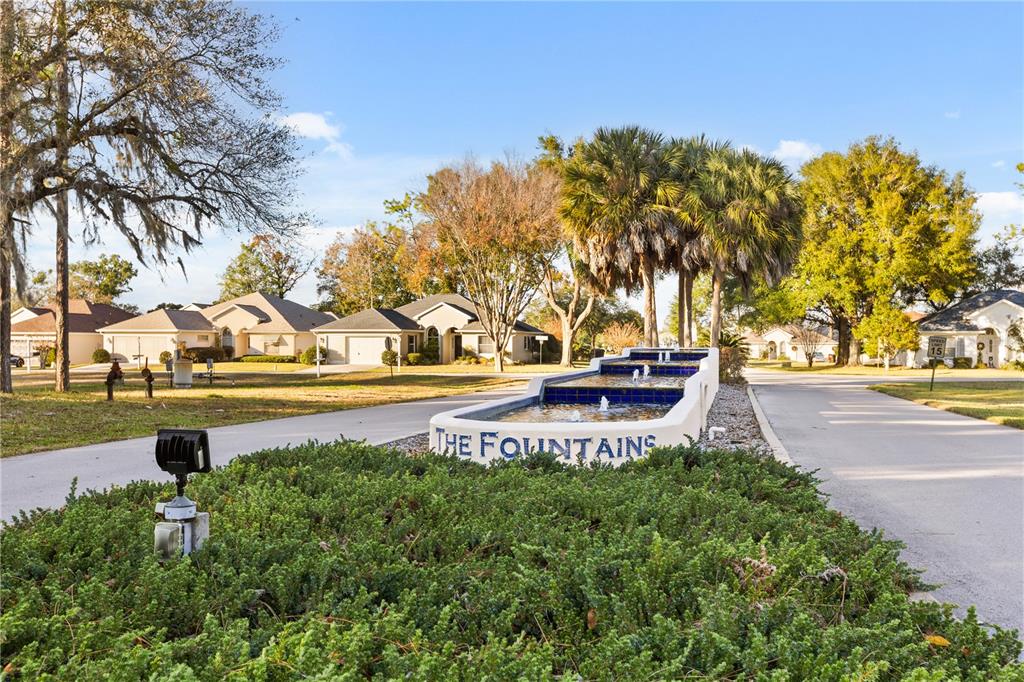 11287 Southwest 73rd Circle Ocala, FL 34476 - Photo 25 of 37 a view of a swimming pool with a yard
