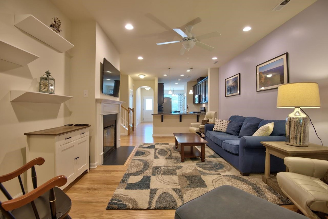 Undisclosed Address Durham, NC 27705 - Photo 12 of 25 a living room with furniture and kitchen view