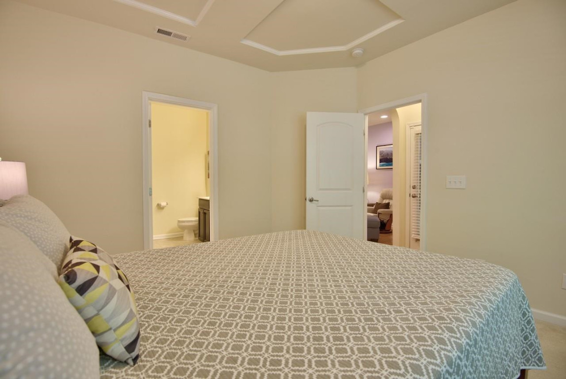 Undisclosed Address Durham, NC 27705 - Photo 15 of 25 a bedroom with a bed and a window