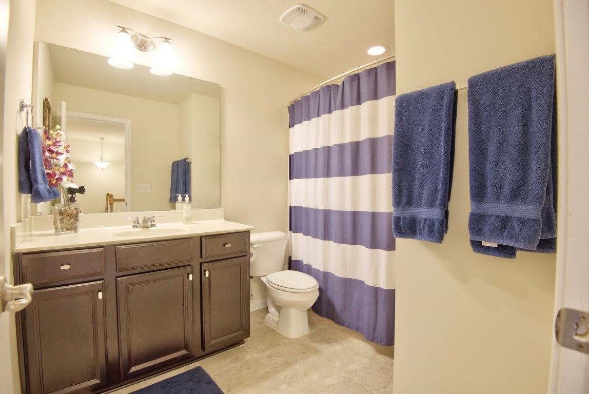 Undisclosed Address Durham, NC 27705 - Photo 20 of 25 a bathroom with a sink a toilet and shower