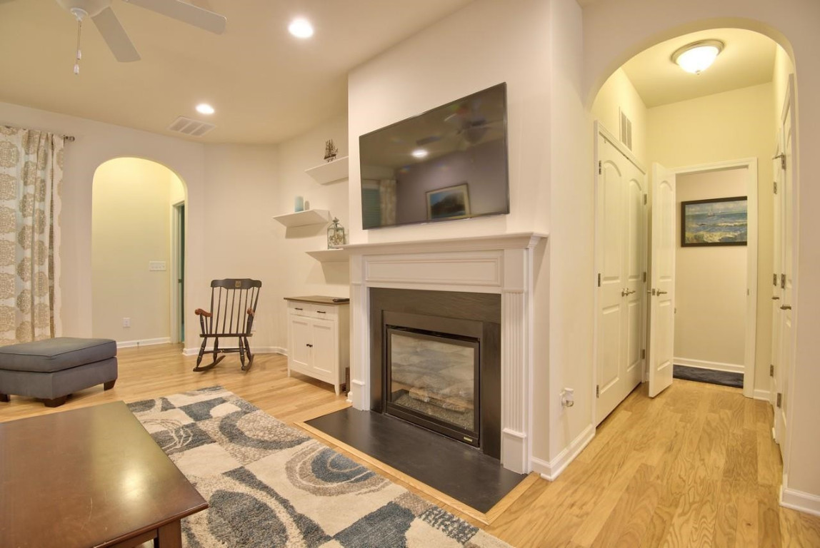 Undisclosed Address Durham, NC 27705 - Photo 10 of 25 a living room with furniture and a fireplace