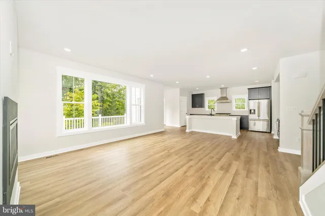 a view of balcony with wooden floor and outdoor space