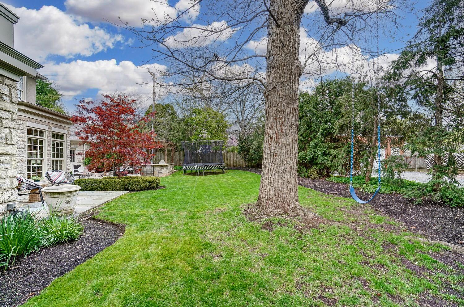 2252 Tremont Road Columbus, OH 43221 - Photo 78 of 97 Added outdoor kitchen, two- level patio and spacious backyard with mature landscaping
