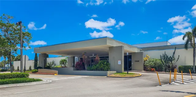 a view of a house with a street