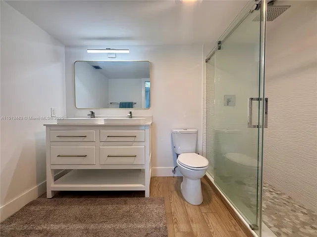 a bathroom with a sink and a toilet