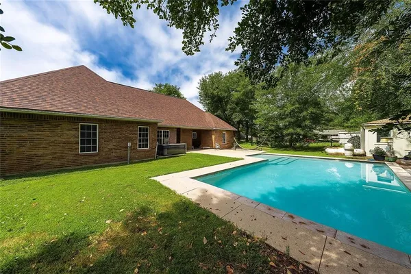 a view of a house with a swimming pool