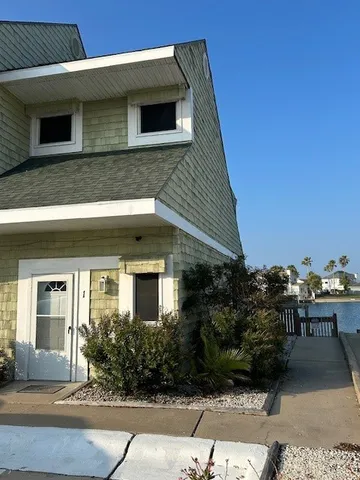a view of a house with many windows