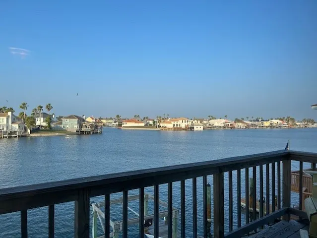 a view of a lake from a balcony