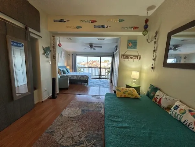 a view of a entryway door of the room