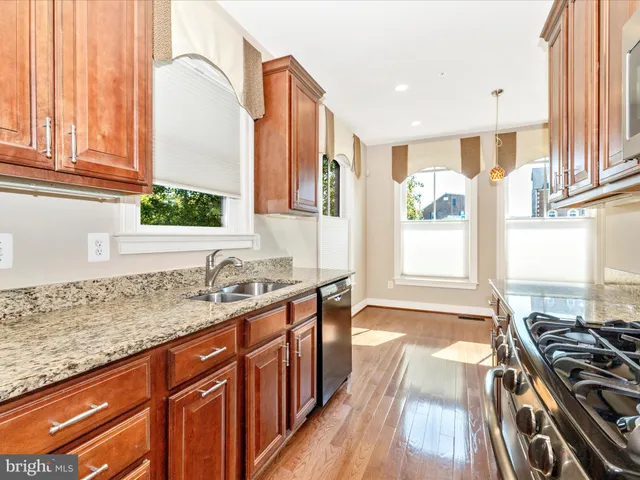 a bed room with a bed and a chandelier