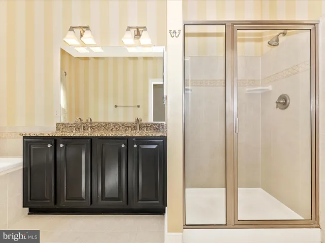 a bathroom with a sink a toilet and a bathtub