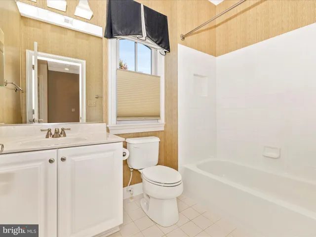 an aerial view of residential houses and outdoor space