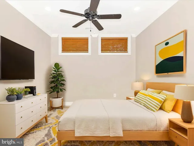 a view of a house with a yard and garden