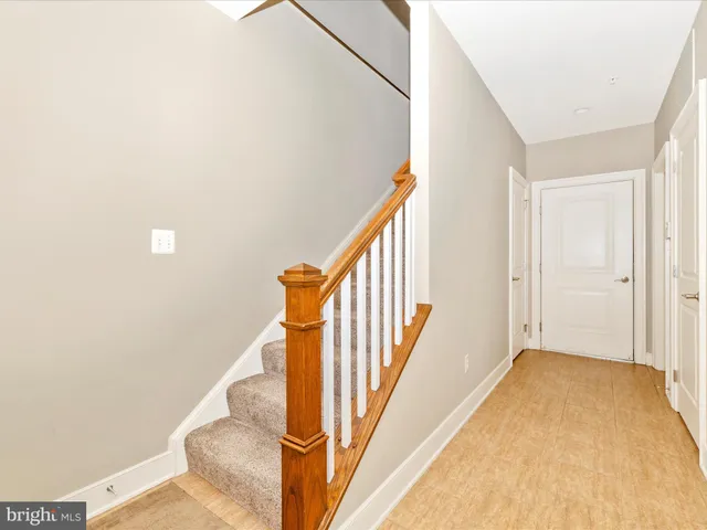 a view of a swimming pool and trees in the background