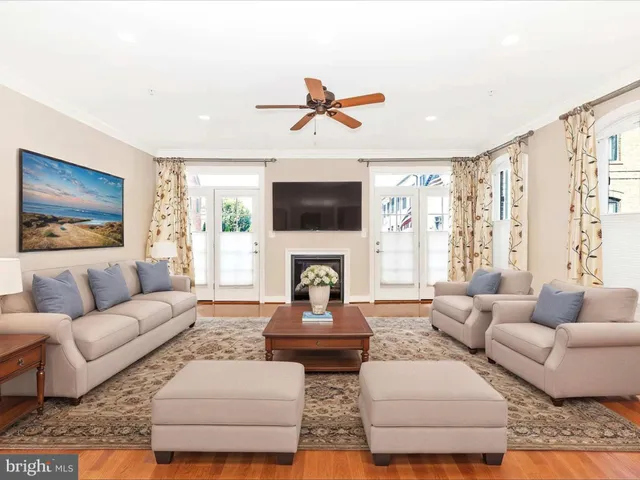 a view of a house with wooden deck