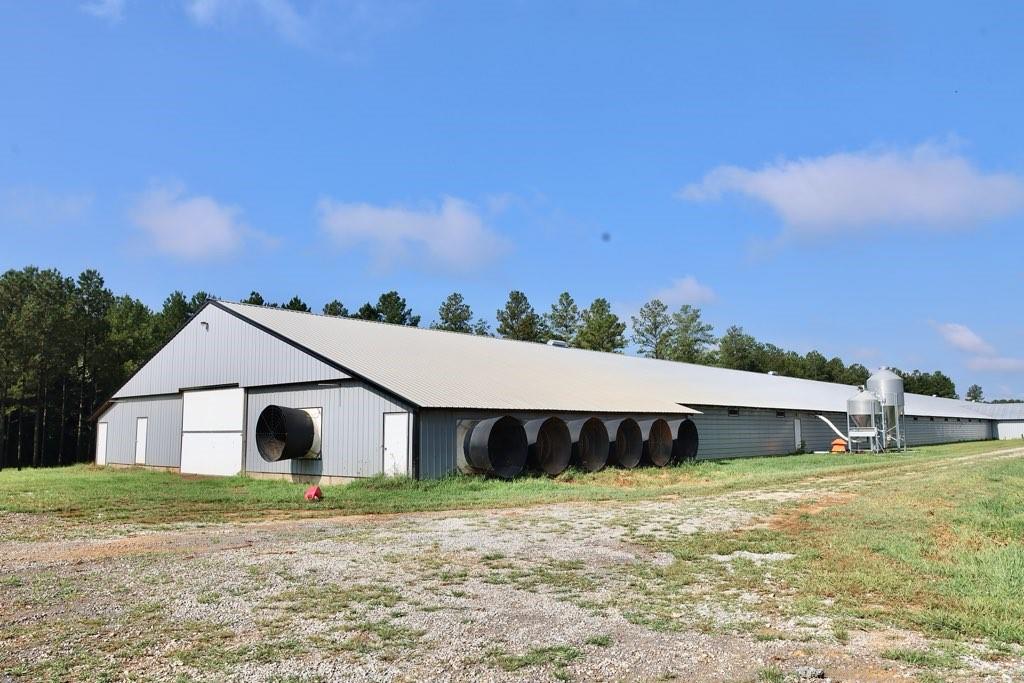 993 Sexton Road Resaca, GA 30735 - Photo 14 of 24 a house view with a garden
