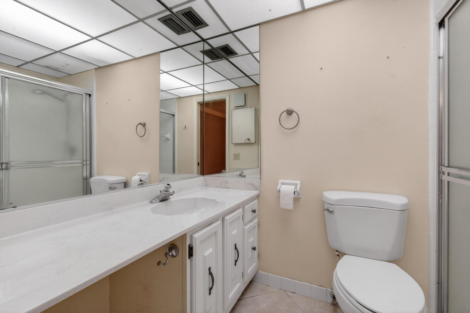 3951 Northeast 19th Road, Unit 1701 Pompano Beach, FL 33064 - Photo 57 of 82 a bathroom with a sink a toilet and shower