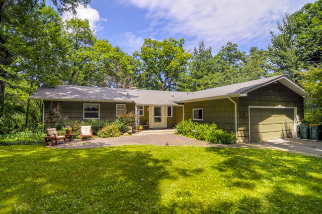 41-w393 Farview Road Elburn, IL 60119 - Photo 1 of 24 a front view of house with yard and outdoor seating