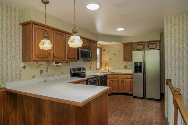 41-w393 Farview Road Elburn, IL 60119 - Photo 7 of 24 a kitchen with a refrigerator a sink and dishwasher with wooden floor