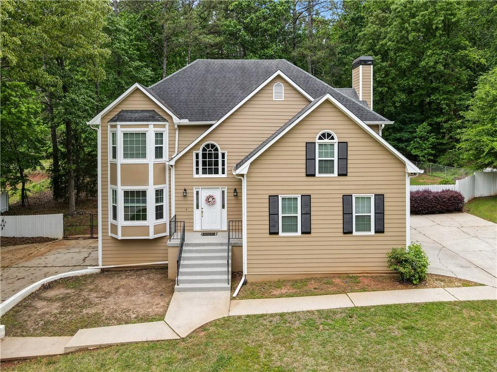 405 Ridgemont Drive Fayetteville, GA 30215 - Photo 43 of 43 a view of a house with a yard