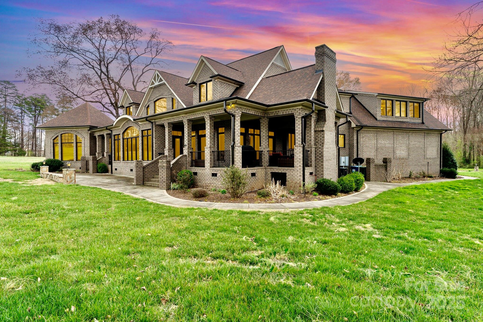 520 Riviera Drive Salisbury, NC 28144 - Photo 2 of 34 a front view of a house with a yard table and chairs