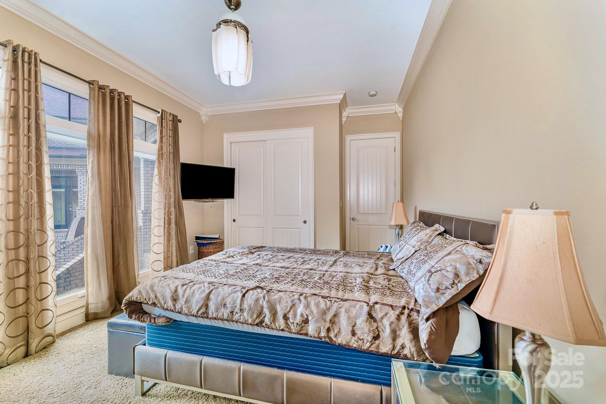 520 Riviera Drive Salisbury, NC 28144 - Photo 21 of 34 a bedroom with a bed tv and a window