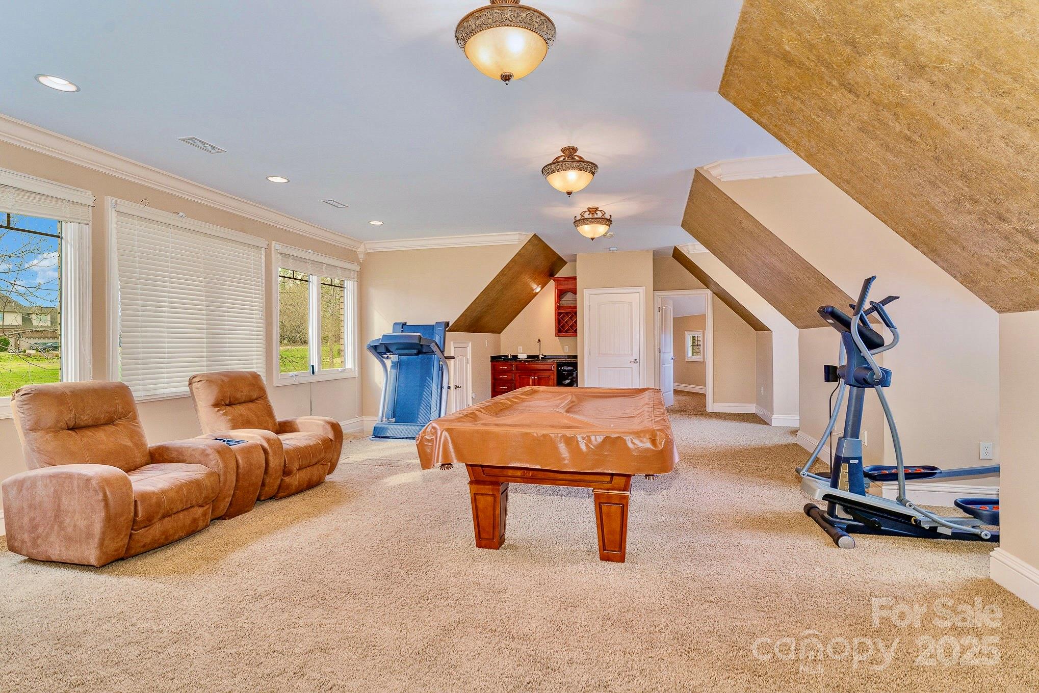 520 Riviera Drive Salisbury, NC 28144 - Photo 26 of 34 a bedroom with furniture and a gym equipment