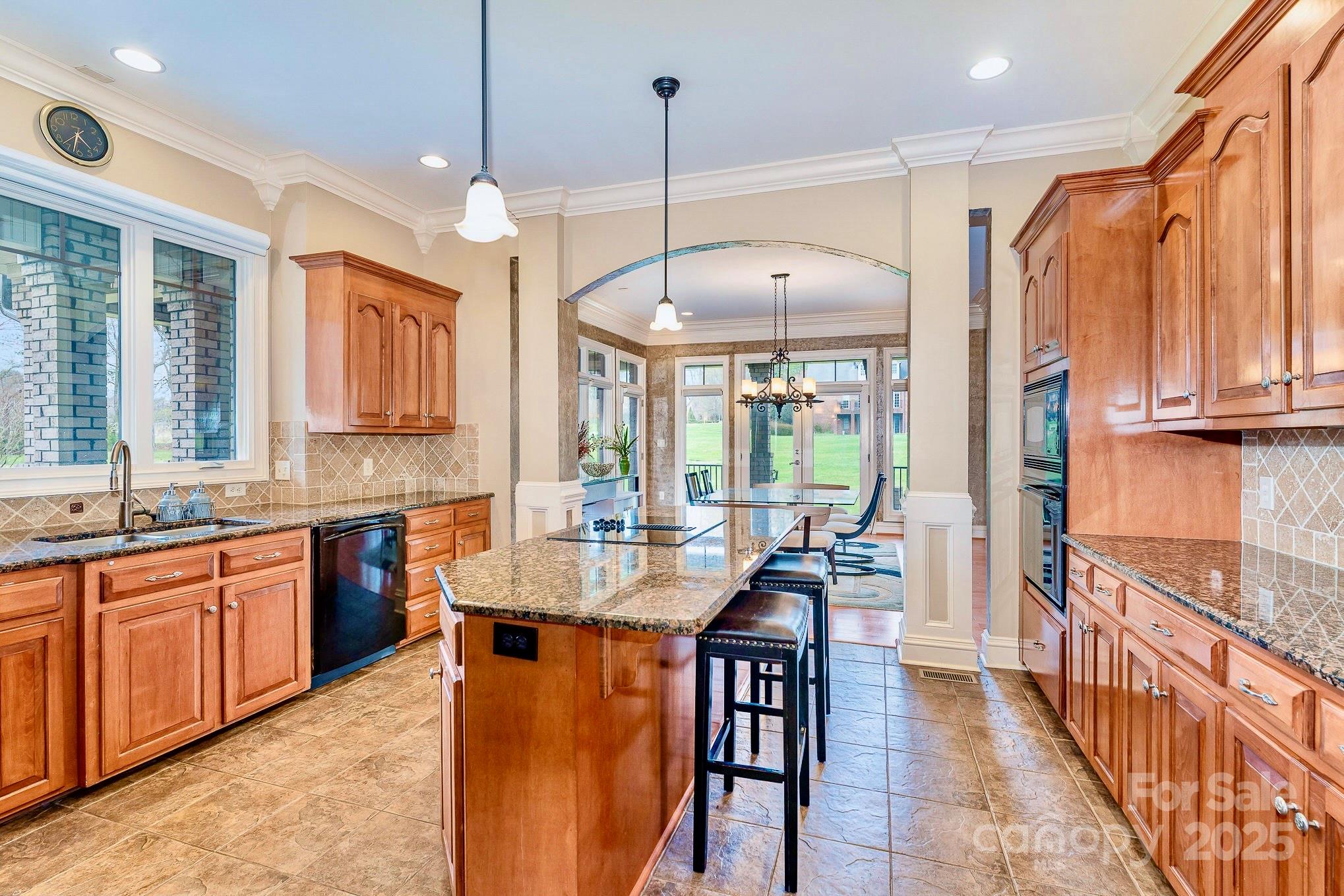 520 Riviera Drive Salisbury, NC 28144 - Photo 9 of 34 a dining hall with stainless steel appliances granite countertop a stove and a sink