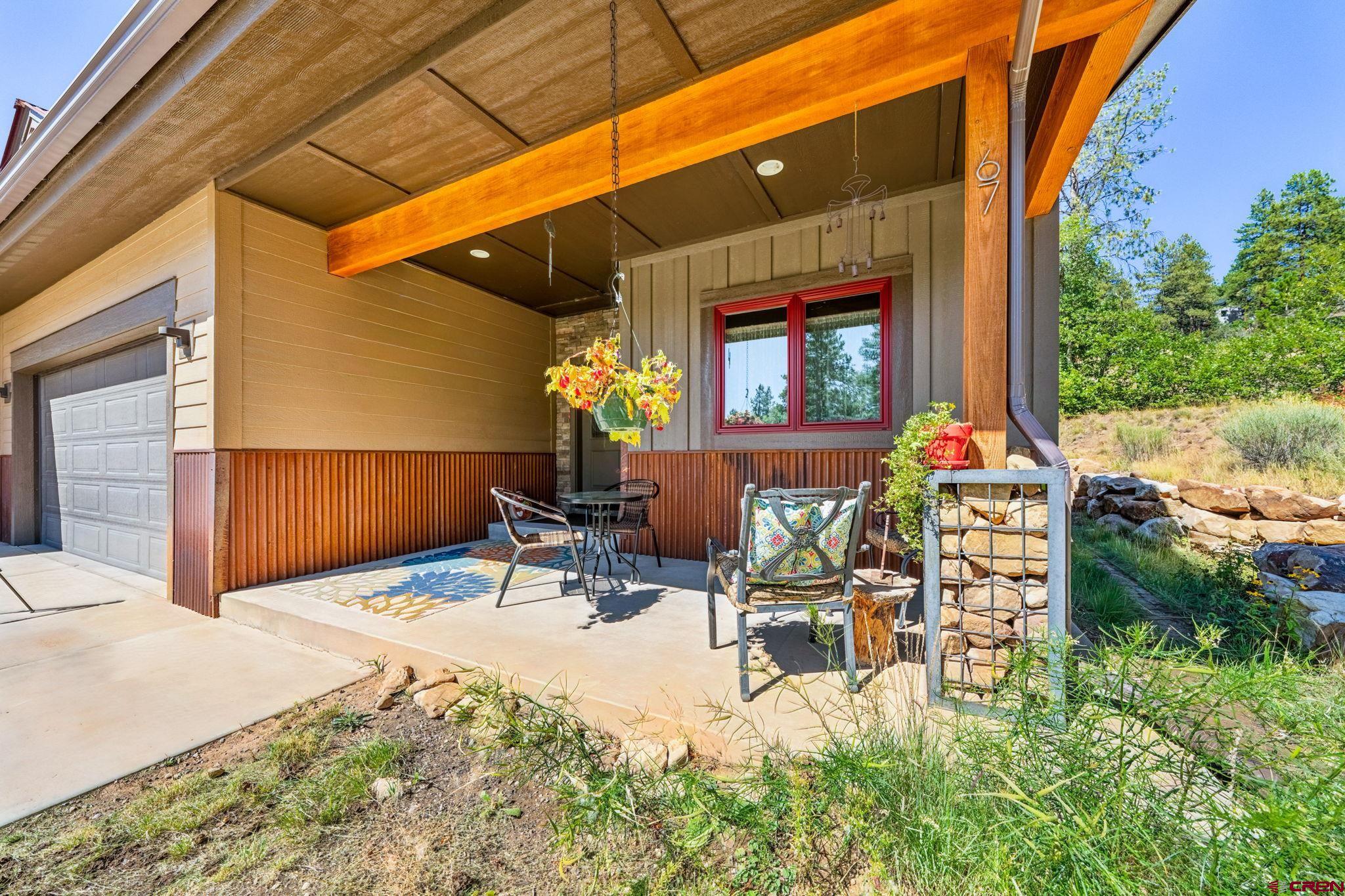 a view of chairs and tables in patio