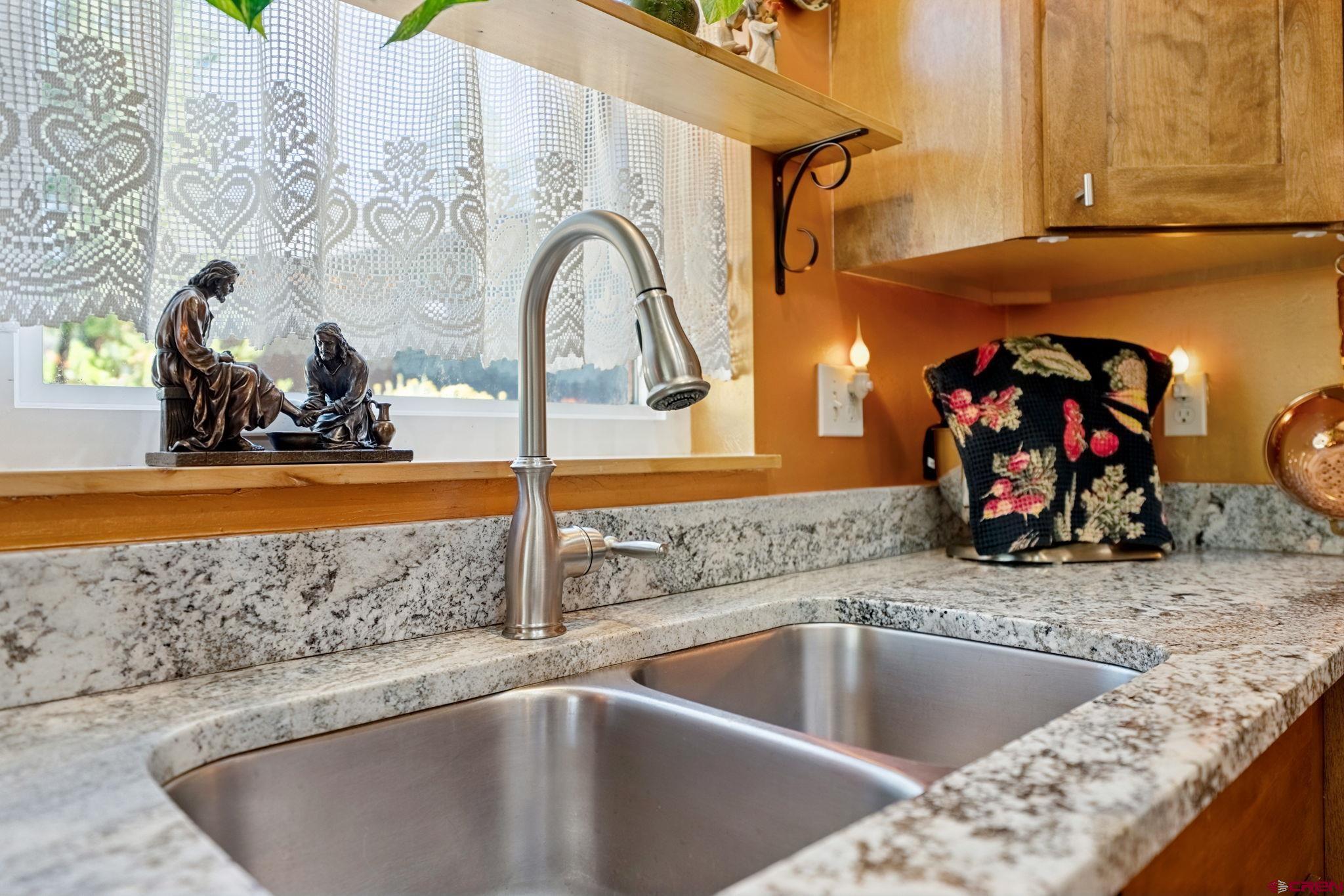 67 Mountain Stream Court Durango, CO 81301 - Photo 9 of 35 a view of a kitchen sink